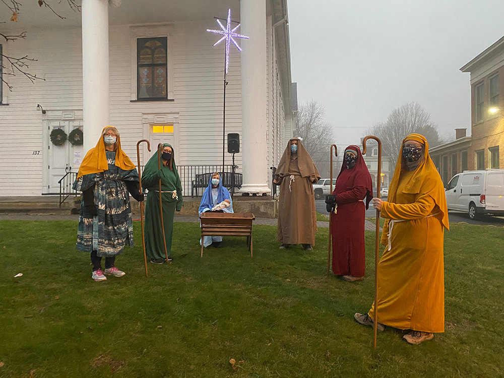 Members of the First Presbyterian Church in the Village of Montgomery recreate the nativity scene. From left to right: Marcia Neubauer, Elizabeth Maida, Kathy Birch, Pastor Jeromey Howard, Marcia Woodall and Robin McPhillips.